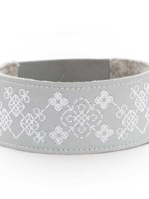 Reflektor-Armband-Käskimallus-von Kirjosilta